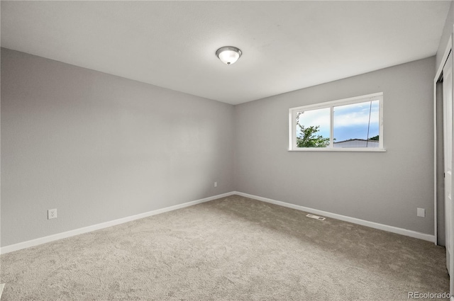 5520 Coyote Ln, Peyton, CO 80831 - carpeted empty room with baseboards