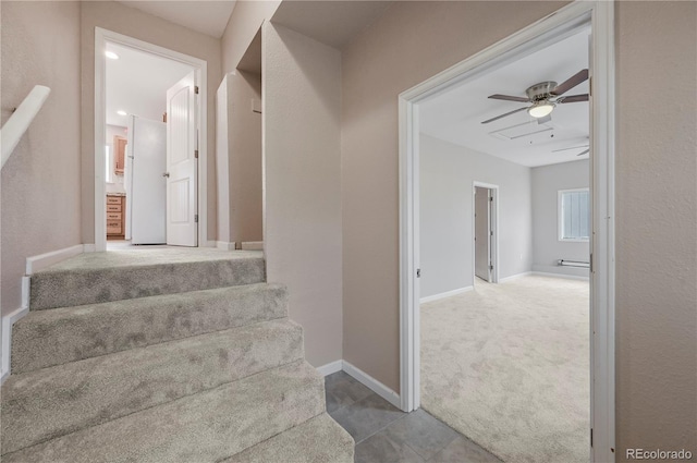 5520 Coyote Ln, Peyton, CO 80831 - staircase with a ceiling fan, carpet floors, and tile patterned floors