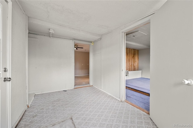 5520 Coyote Ln, Peyton, CO 80831 - unfurnished room featuring carpet floors and ceiling fan