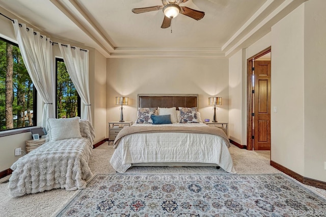 1250 Cottontail Trl, Woodland Park, CO 80863 - bedroom with carpet flooring, a tray ceiling, and ceiling fan