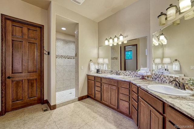 1250 Cottontail Trl, Woodland Park, CO 80863 - full bathroom with tiled shower, double vanity, and tile patterned floors
