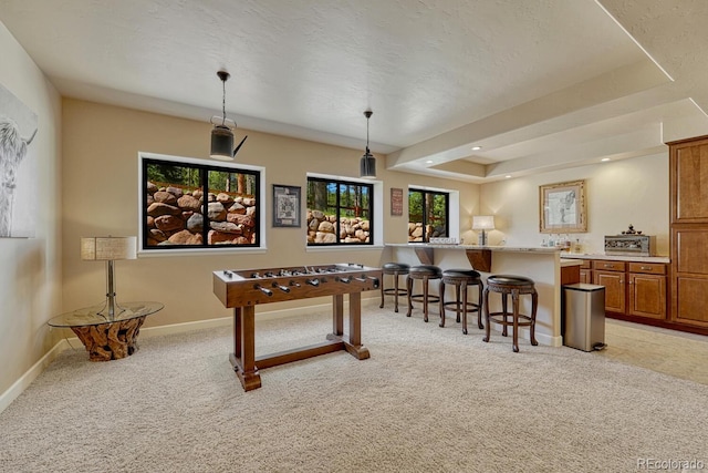 1250 Cottontail Trl, Woodland Park, CO 80863 - game room with light colored carpet, a raised ceiling, and recessed lighting