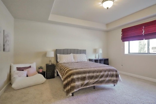 1250 Cottontail Trl, Woodland Park, CO 80863 - bedroom featuring carpet floors and a tray ceiling