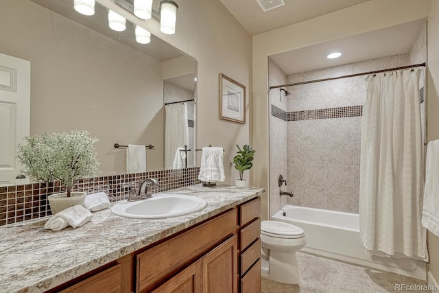 1250 Cottontail Trl, Woodland Park, CO 80863 - full bathroom featuring vanity, shower / bath combo with shower curtain, tasteful backsplash, and tile patterned floors