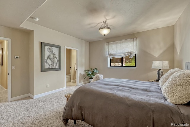 1250 Cottontail Trl, Woodland Park, CO 80863 - bedroom featuring carpet flooring and ensuite bathroom