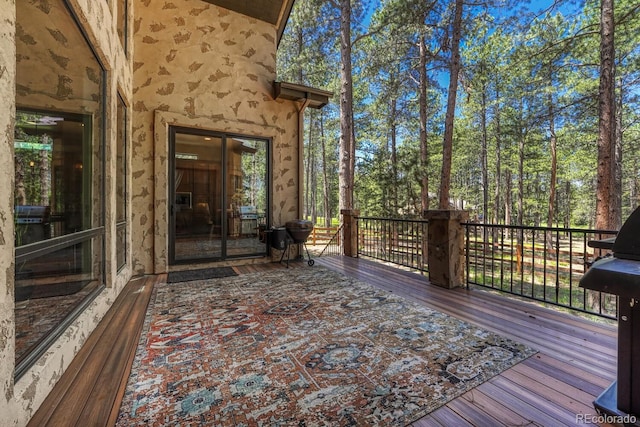 1250 Cottontail Trl, Woodland Park, CO 80863 - wooden terrace featuring a grill