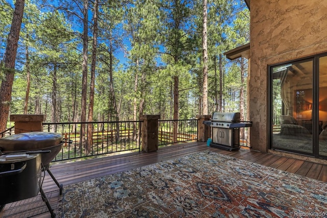 1250 Cottontail Trl, Woodland Park, CO 80863 - wooden deck with a grill