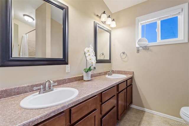 bathroom with toilet, tile patterned floors, a shower with shower curtain, and vanity