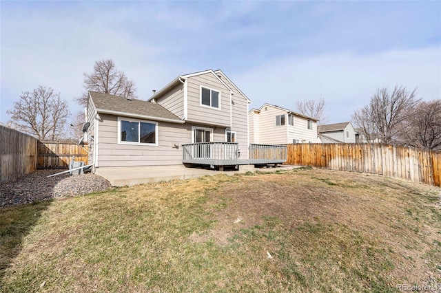 13504 Pecos St, Westminster, CO 80234 - back of house with a deck and a fenced backyard