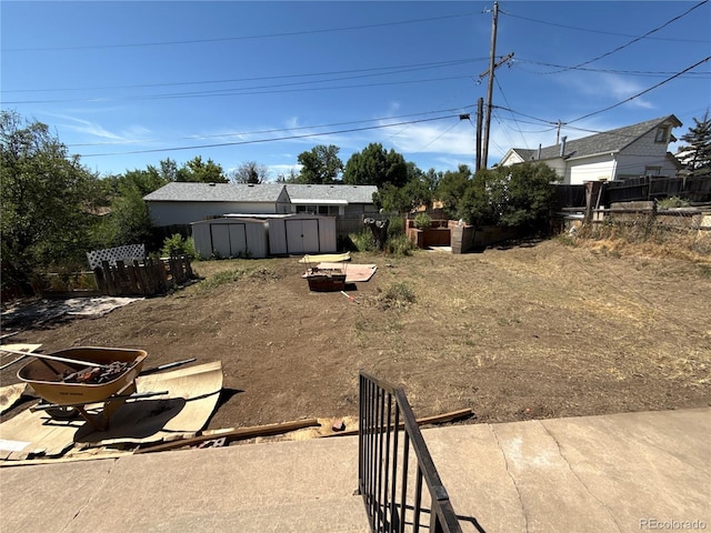 5162 W Nevada Pl, Denver, CO 80219 - view of yard featuring a storage shed