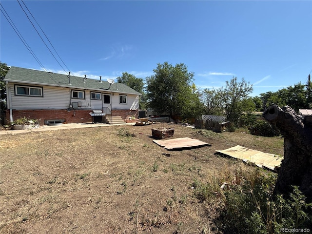 5162 W Nevada Pl, Denver, CO 80219 - view of yard featuring an outdoor fire pit