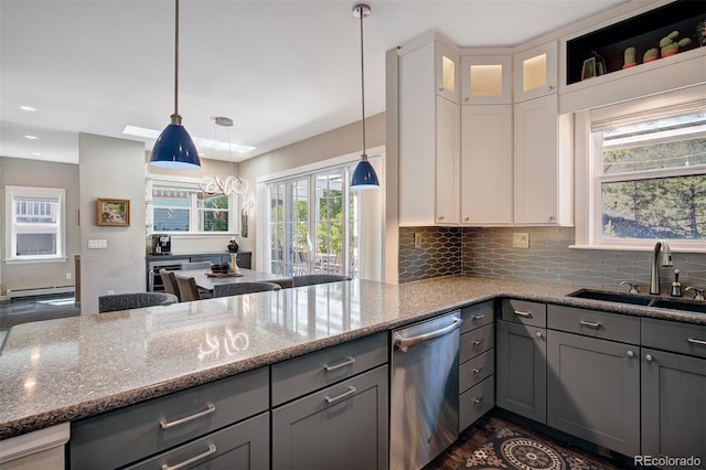 17 Meadow Lark Grn, Breckenridge, CO 80424 - kitchen featuring dishwasher, gray cabinets, a baseboard heating unit, light stone countertops, and tasteful backsplash