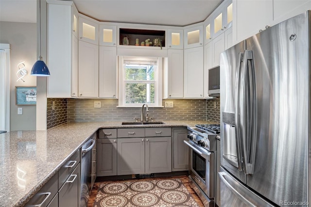 17 Meadow Lark Grn, Breckenridge, CO 80424 - kitchen with stainless steel appliances, backsplash, light stone countertops, and white cabinetry