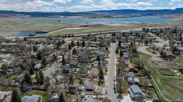 8170 S Marshall Ct, Littleton, CO 80128 - birds eye view of property with a water and mountain view and a residential view