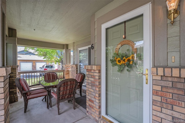2900 Purcell St Unit 6, Brighton, CO 80601 - entrance to property featuring covered porch and brick siding