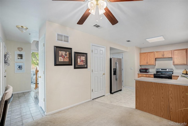 2900 Purcell St Unit 6, Brighton, CO 80601 - kitchen featuring stainless steel fridge with ice dispenser, electric range oven, black microwave, ceiling fan, and light countertops