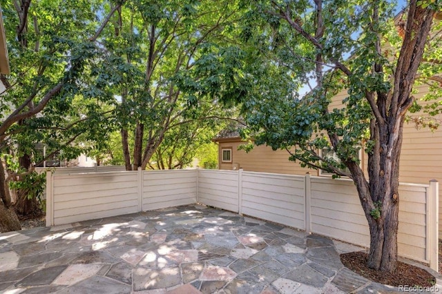 view of patio featuring a fenced backyard