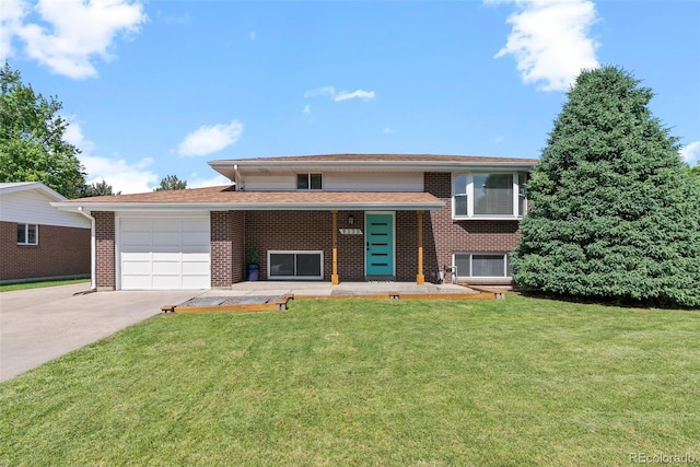 8333 Depew Way, Arvada, CO 80003 - view of front facade featuring concrete driveway, a garage, brick siding, a front yard, and a shingled roof