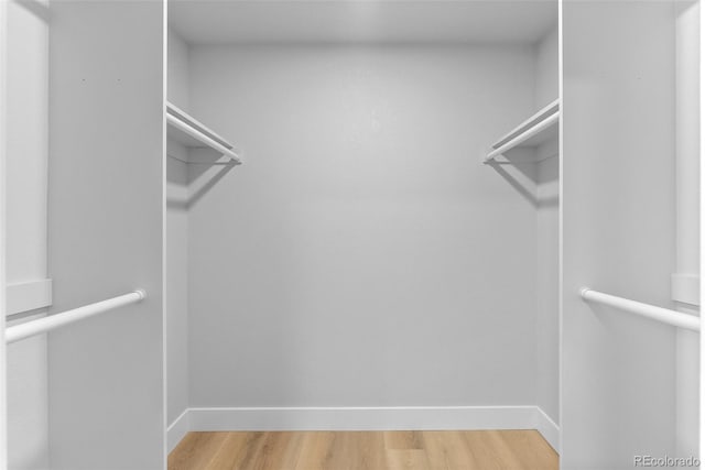 8333 Depew Way, Arvada, CO 80003 - spacious closet featuring light wood-style floors