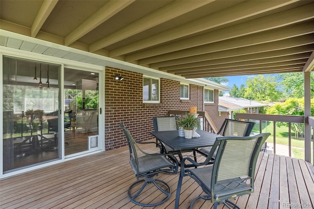 8333 Depew Way, Arvada, CO 80003 - wooden terrace featuring outdoor dining area