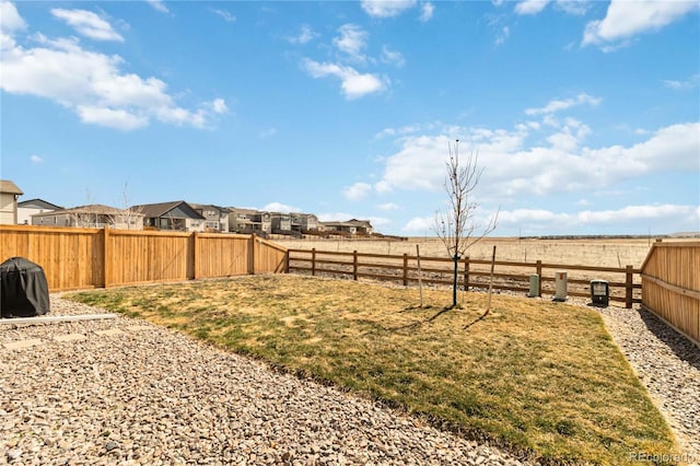 view of yard featuring a fenced backyard