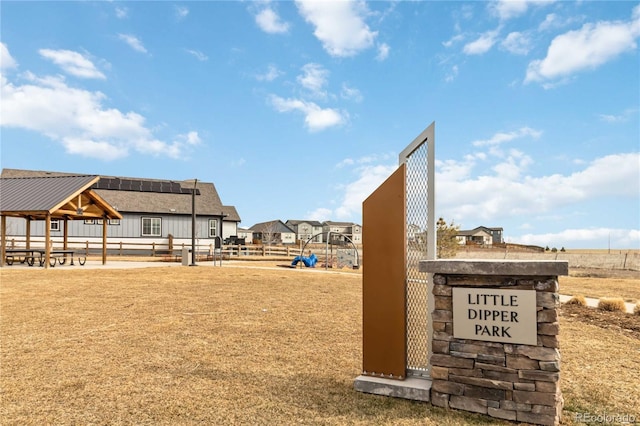 view of community with fence