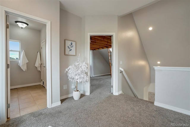 15580 Rigge Ct, Elbert, CO 80106 - corridor with an upstairs landing, carpet floors, baseboards, recessed lighting, and tile patterned floors
