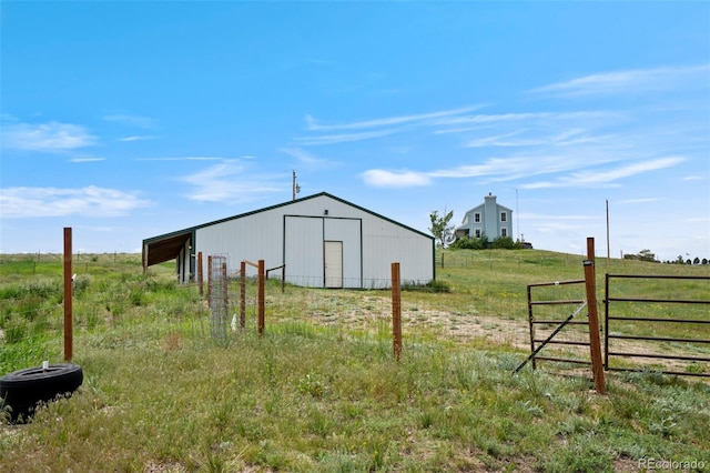 15580 Rigge Ct, Elbert, CO 80106 - view of pole building featuring a view of rural / pastoral area