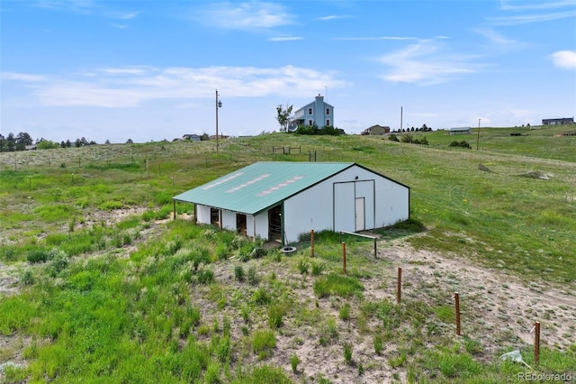 15580 Rigge Ct, Elbert, CO 80106 - view of pole building featuring a rural view