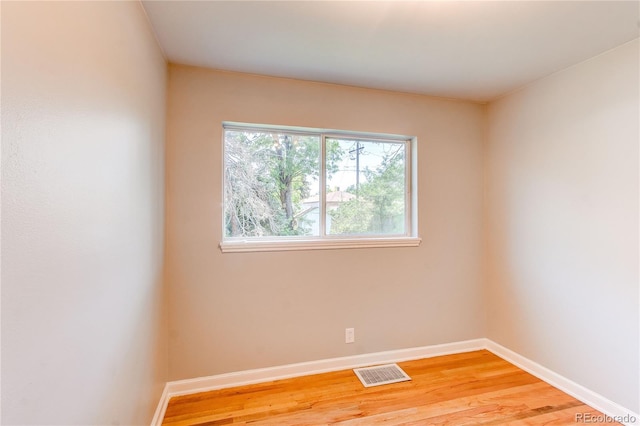 1170 Kingston St, Aurora, CO 80010 - spare room with light wood-style flooring and baseboards