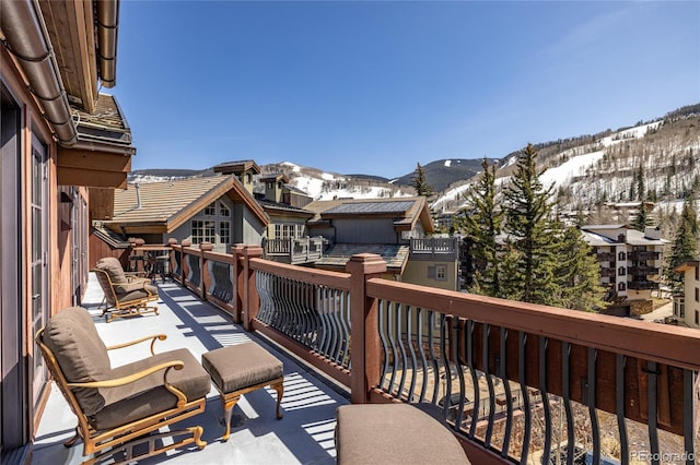 balcony featuring a mountain view