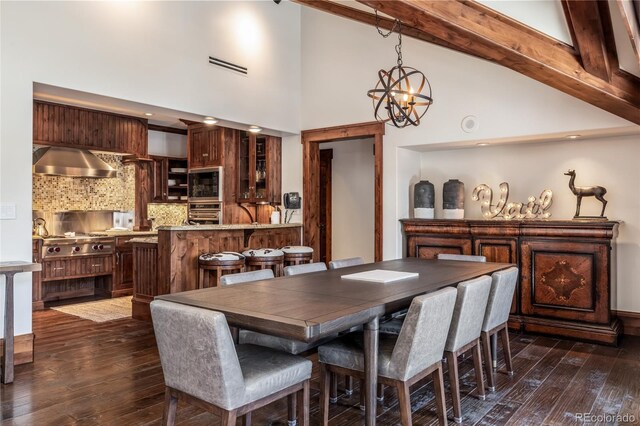 dining room with beamed ceiling, a chandelier, high vaulted ceiling, and dark wood-type flooring