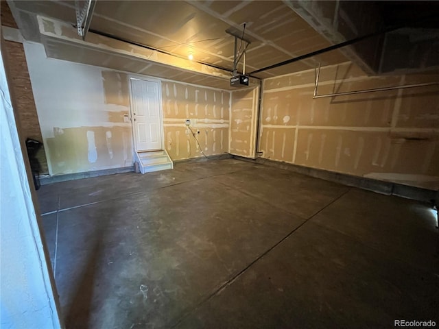 20558 E Grand Ln, Aurora, CO 80015 - garage featuring a garage door opener