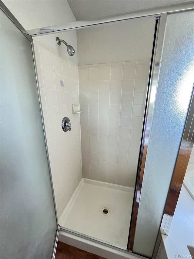 20558 E Grand Ln, Aurora, CO 80015 - full bathroom with a stall shower