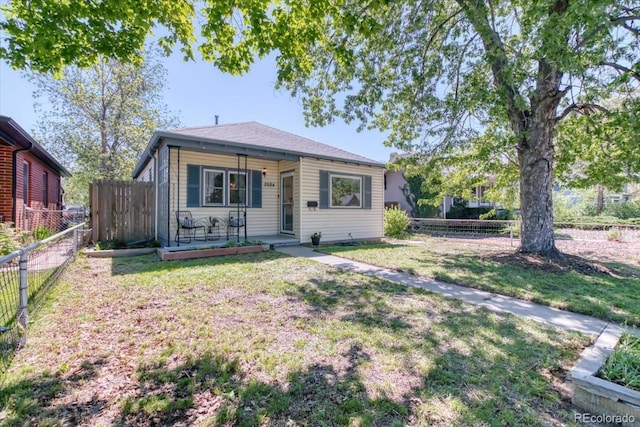 2684 S Logan St, Denver, CO 80210 - bungalow-style home featuring covered porch