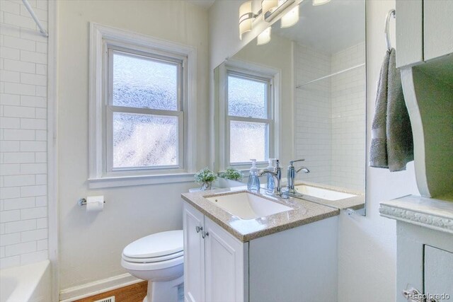 2684 S Logan St, Denver, CO 80210 - full bath with vanity, toilet, and bathtub / shower combination