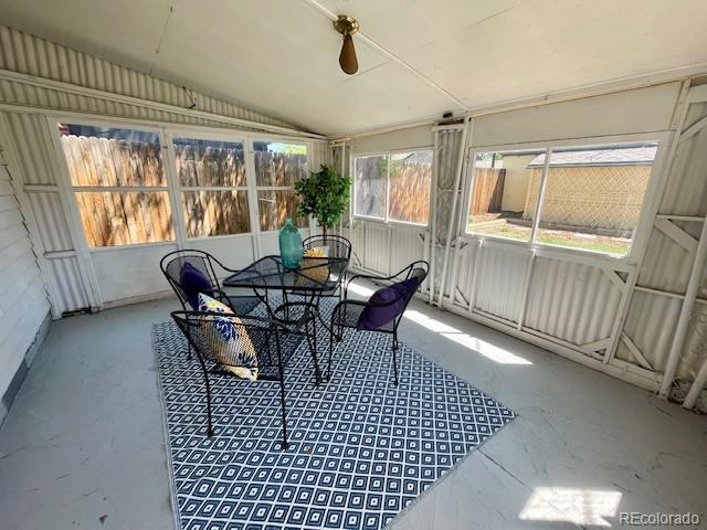 2684 S Logan St, Denver, CO 80210 - sunroom / solarium with lofted ceiling and outdoor dining space