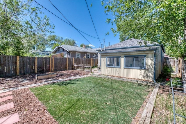 2684 S Logan St, Denver, CO 80210 - rear view of property with board and batten siding
