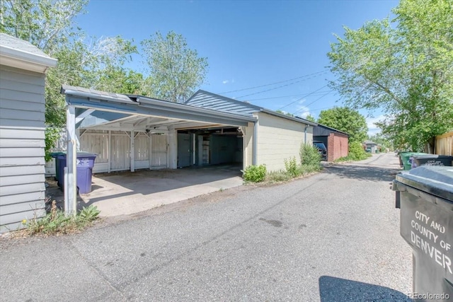 2684 S Logan St, Denver, CO 80210 - view of vehicle parking featuring a carport