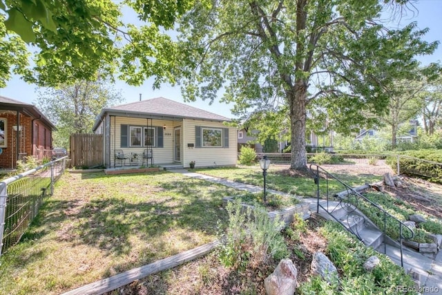 2684 S Logan St, Denver, CO 80210 - bungalow featuring a vegetable garden and a porch