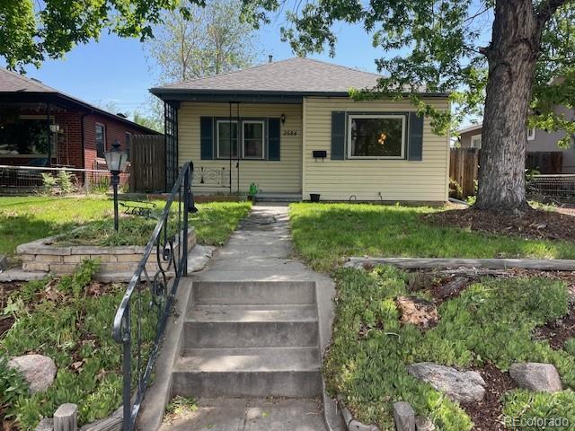 2684 S Logan St, Denver, CO 80210 - bungalow-style house featuring a porch