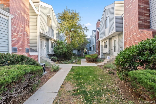 view of community with a lawn