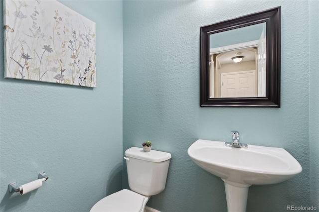 139 N Prairie Falcon Pkwy, Brighton, CO 80601 - half bathroom featuring toilet
