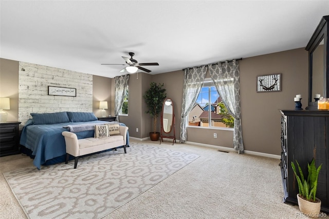 139 N Prairie Falcon Pkwy, Brighton, CO 80601 - bedroom with light carpet, baseboards, and a ceiling fan