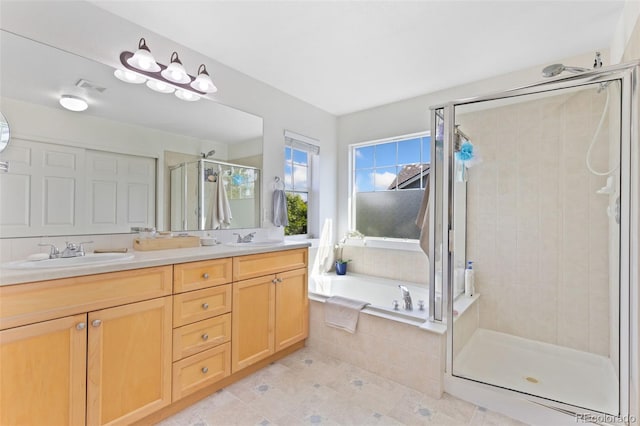 139 N Prairie Falcon Pkwy, Brighton, CO 80601 - full bathroom with a stall shower, double vanity, a bath, and tile patterned flooring