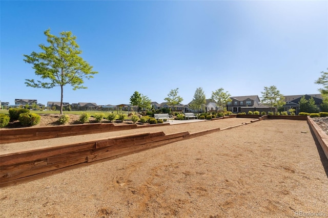 139 N Prairie Falcon Pkwy, Brighton, CO 80601 - view of yard featuring a game area and a residential view