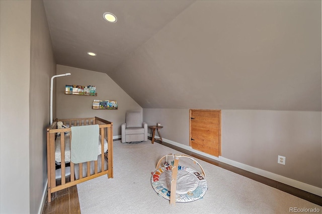 additional living space featuring recessed lighting, baseboards, wood finished floors, and lofted ceiling