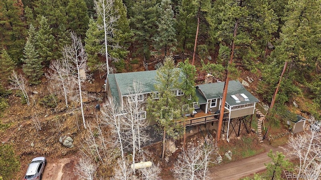aerial view with a wooded view