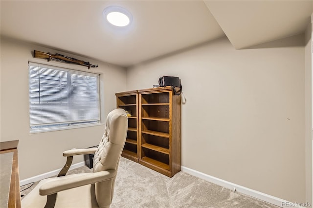 carpeted office space with baseboards