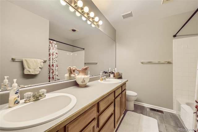 full bath featuring toilet, visible vents, and a sink